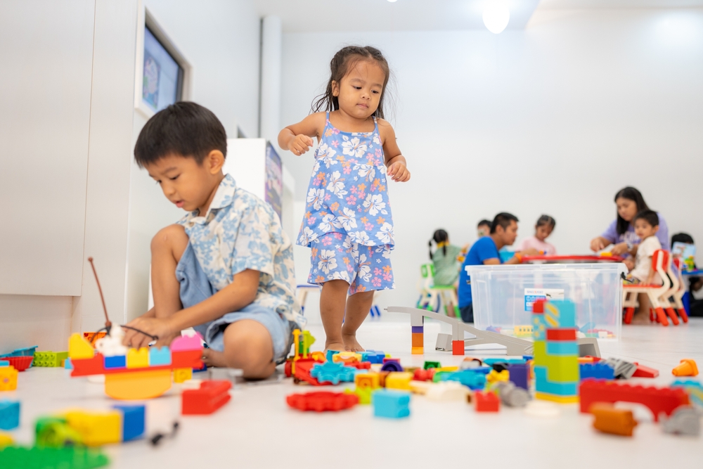 Adorable,preschool,asian,kid,boy,and,girl,enjoying,play,colorful