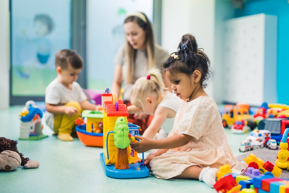 Preschoolers,building,with,toys,and,cubes,and,enjoying,in,kindergarten